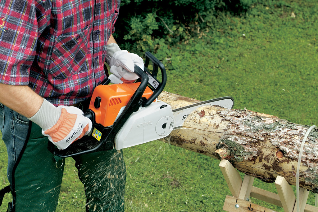 Walls of the interior chamber being cut with a STIHL chainsaw