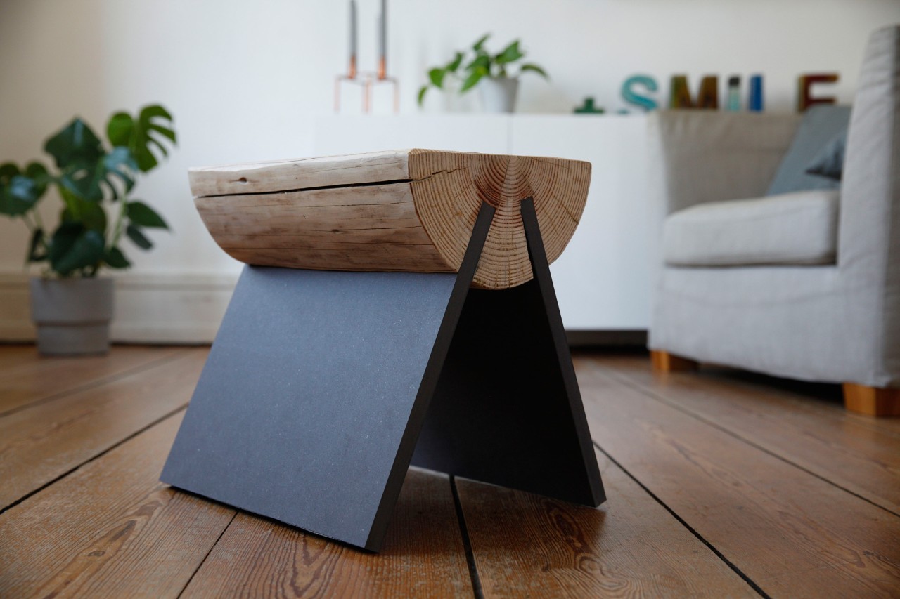 A finished DIY log stool