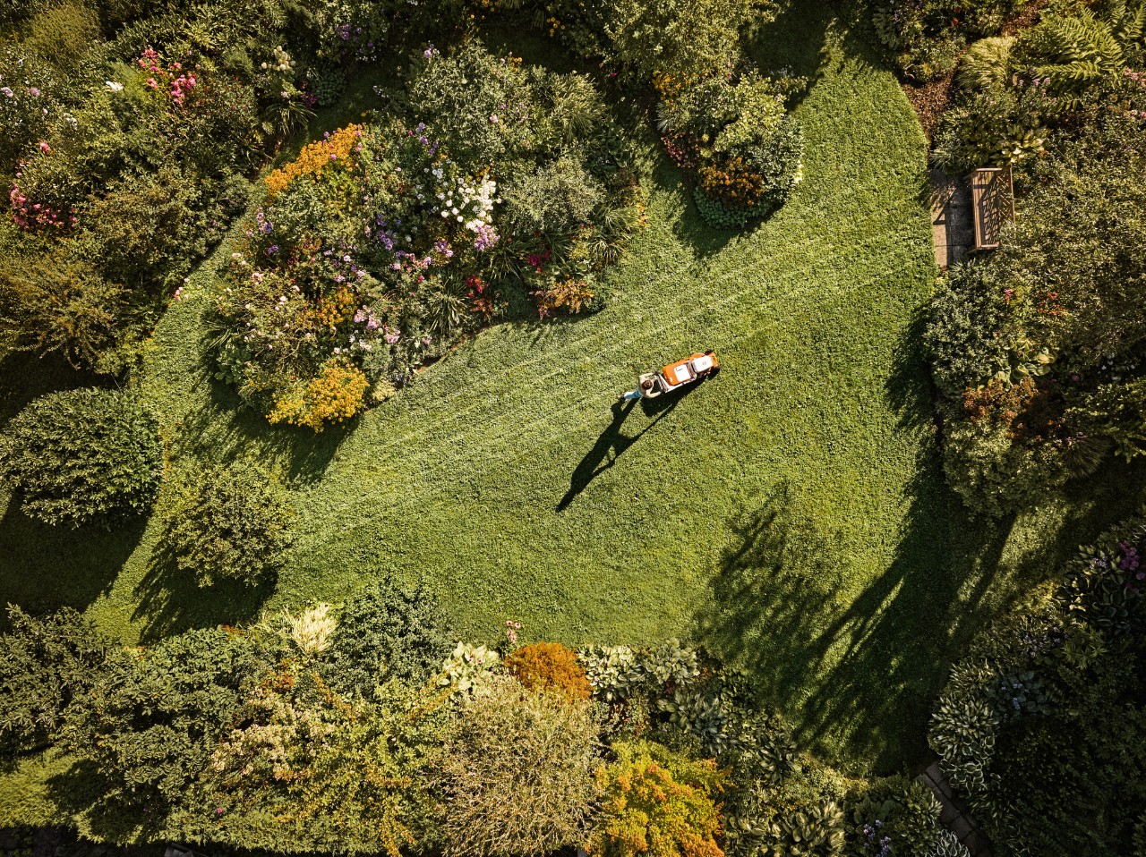 Person mowing a lawn