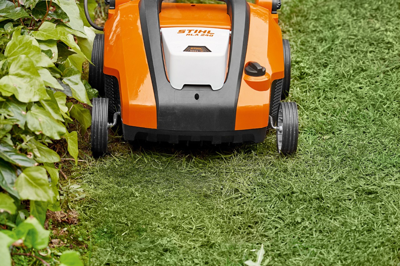Close-up of a STIHL RLA 240 cordless lawn aerator