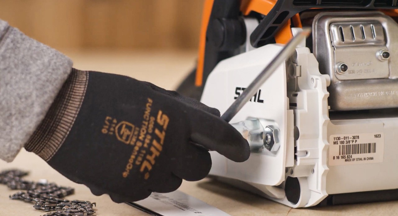 Close-up of the chain sprocket cover on a STIHL MSA 180 cordless chainsaw