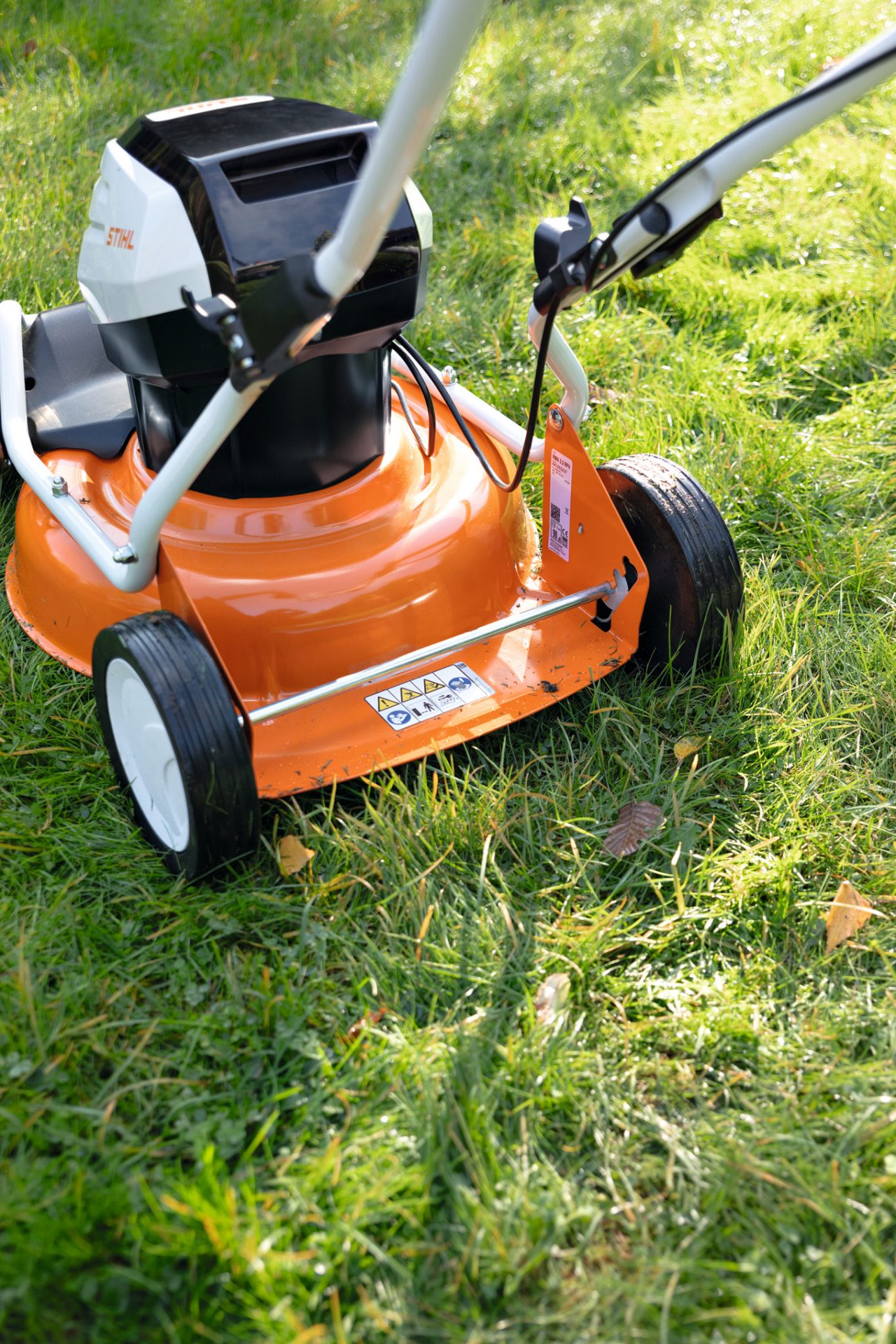 A STIHL RMA 2 RV mulching mower on grass