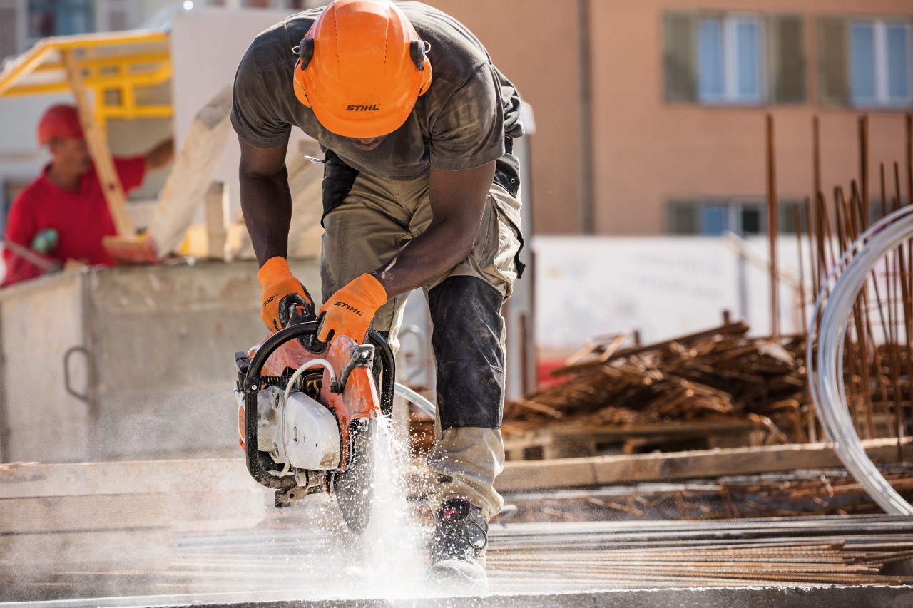 A man working on a construction site with a STIHL TS 500i cut-off machine
